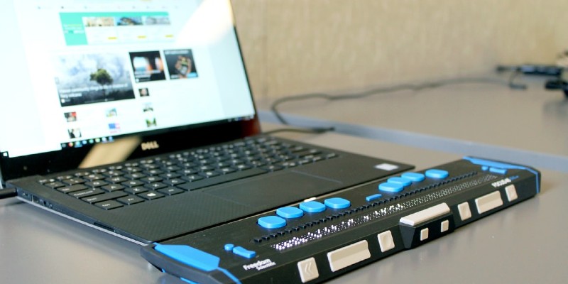 A computer with a refreshable braille display.