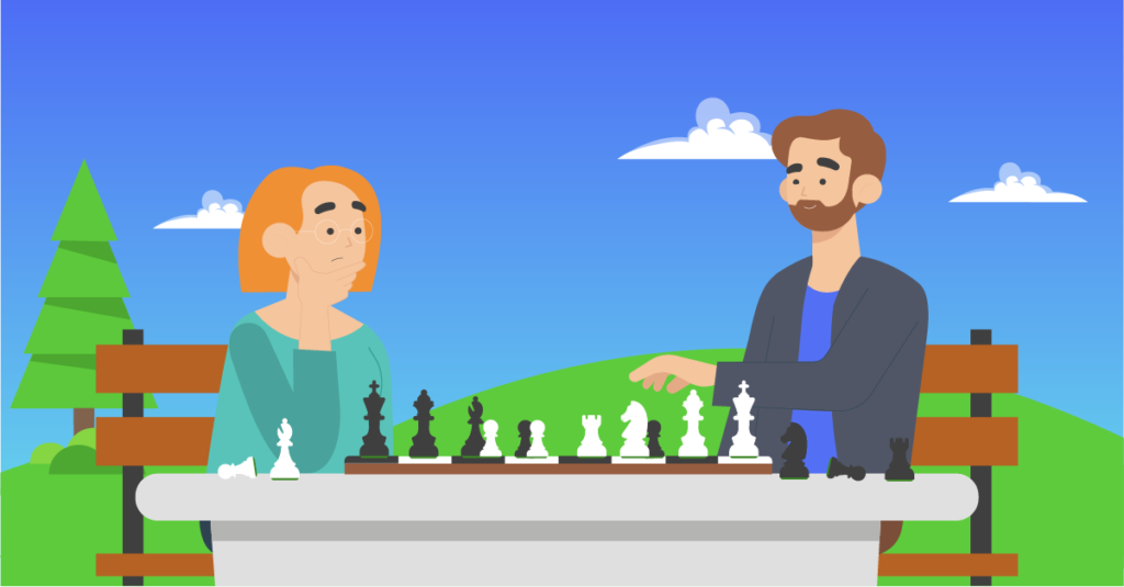 A man and a woman play a strategic game of chess.